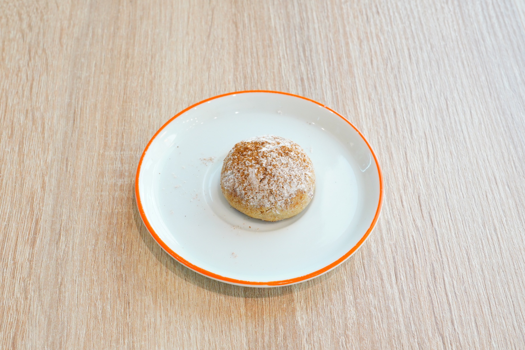 Powdered sugar-dusted ma'amoul cookie